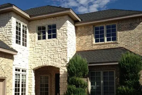 A two-storey stone and brick home in Lubbock